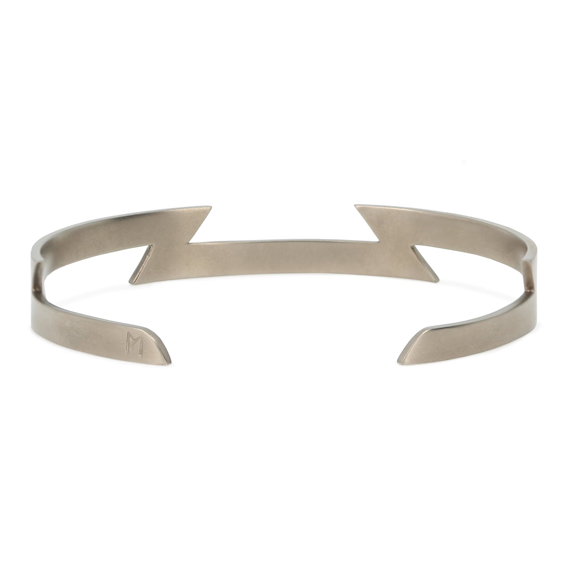 Top perspective of Maxwell Pontail's sleek titanium bracelet featuring sharp angles and a discreet 'M' engraving.