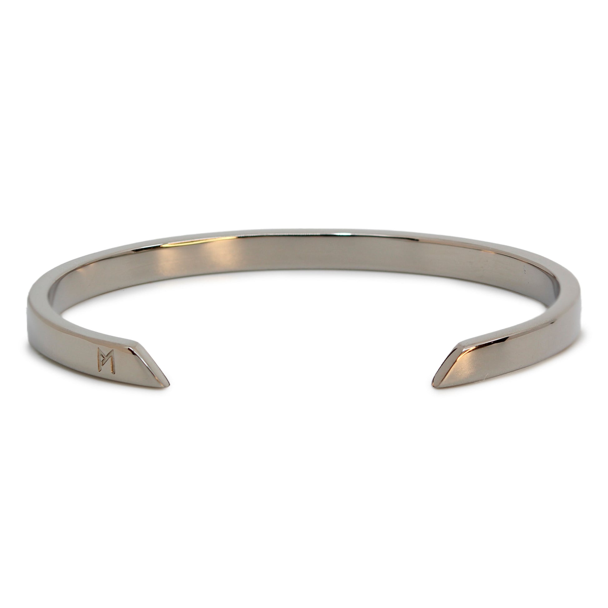 Single silver-colored titanium bangle, 5 mm wide. Image shows back view of bangle.
