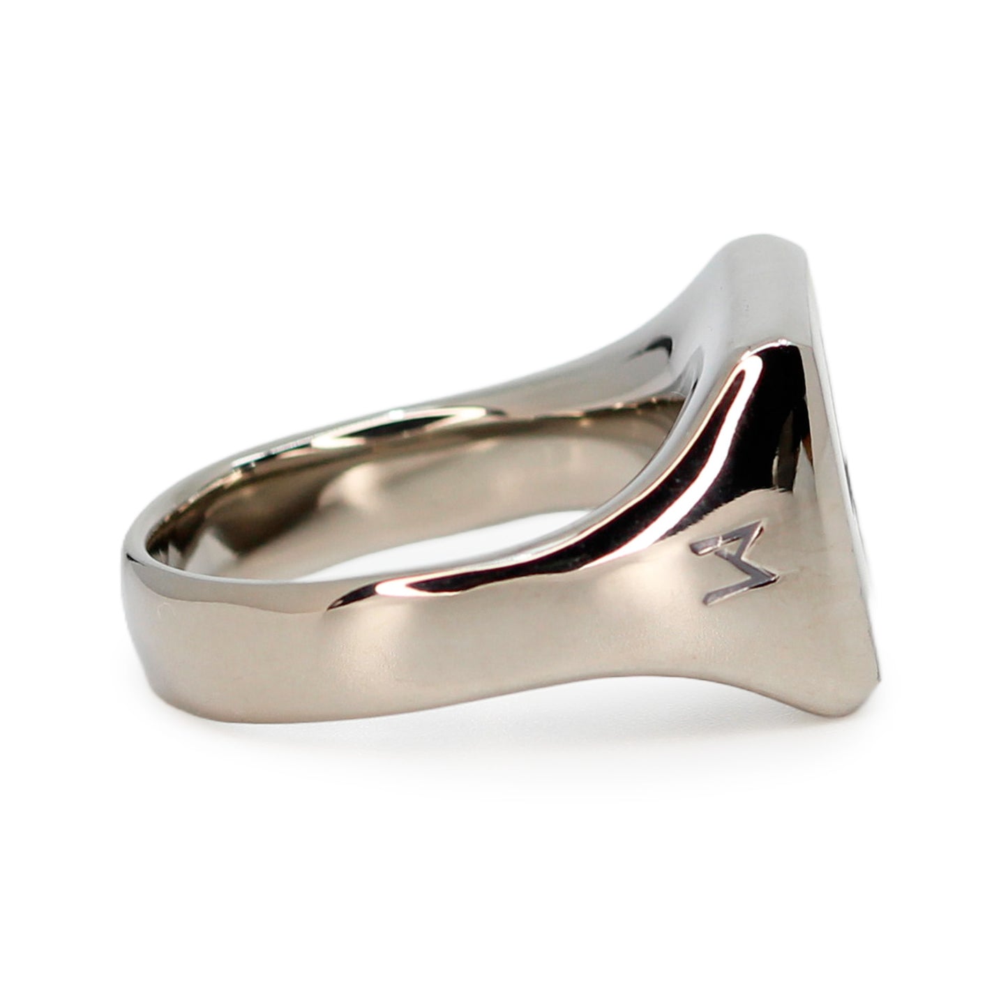 Single silver-colored titanium signet ring, 15x15 mm wide surface with an engraved lightning bolt. Image shows side view of the ring
