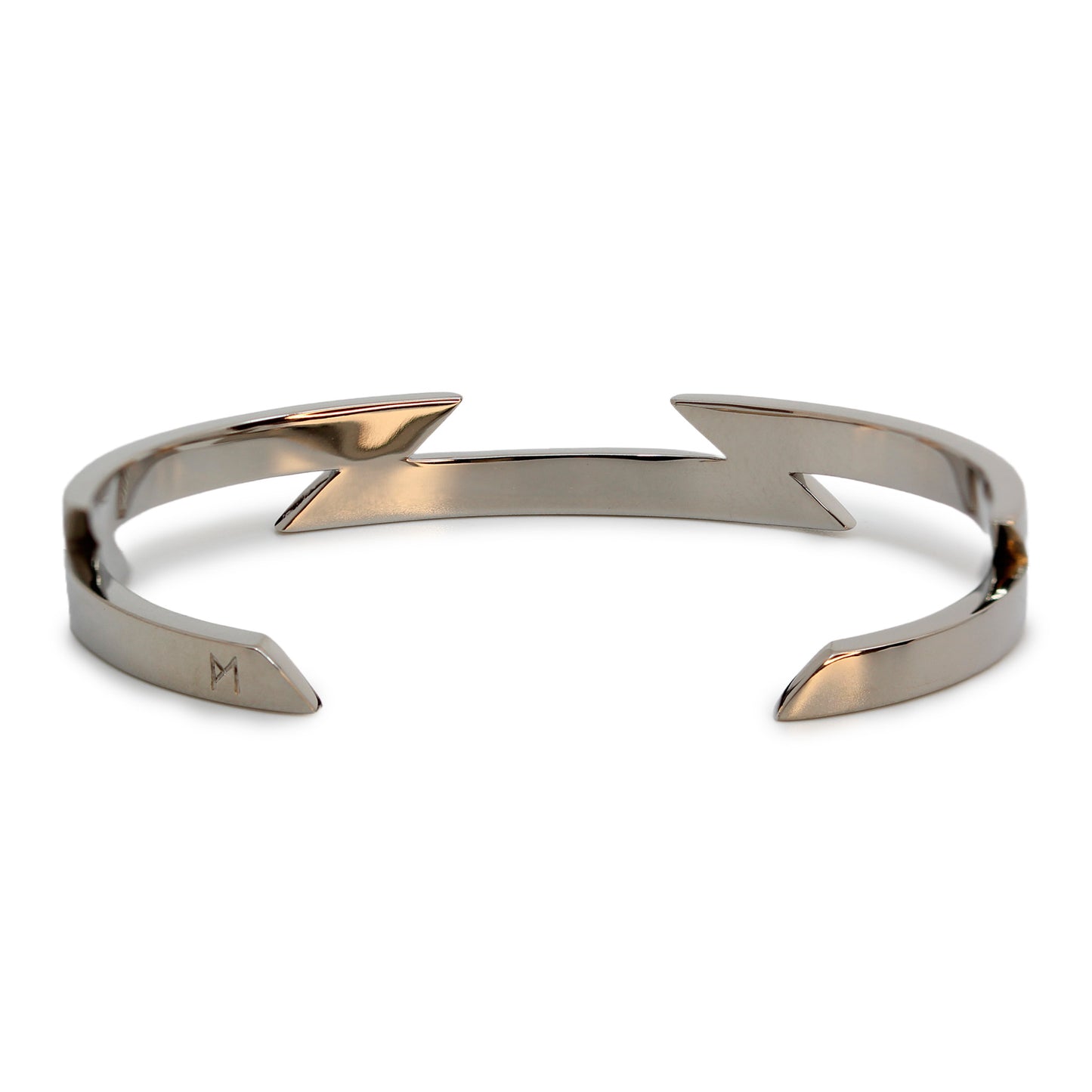Single silver-colored titanium bangle with zig-zag pattern, 1 cm thick. Image shows back view of bangle.