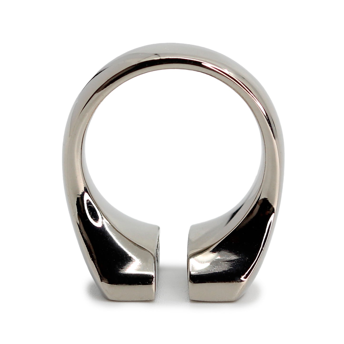 Single silver-colored titanium signet ring, 15x15 mm wide surface which has been cut through the middle. Image shows view of the ring top facing down